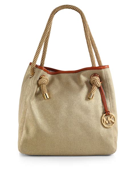 michael kors canvas tote handbags.